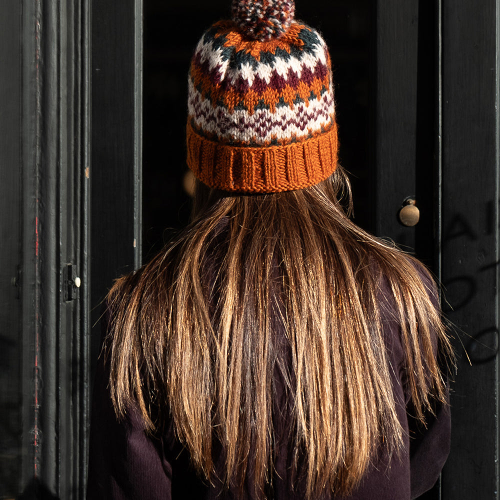 
                      
                        Nora Fair Isle Wool Bobble Hat
                      
                    